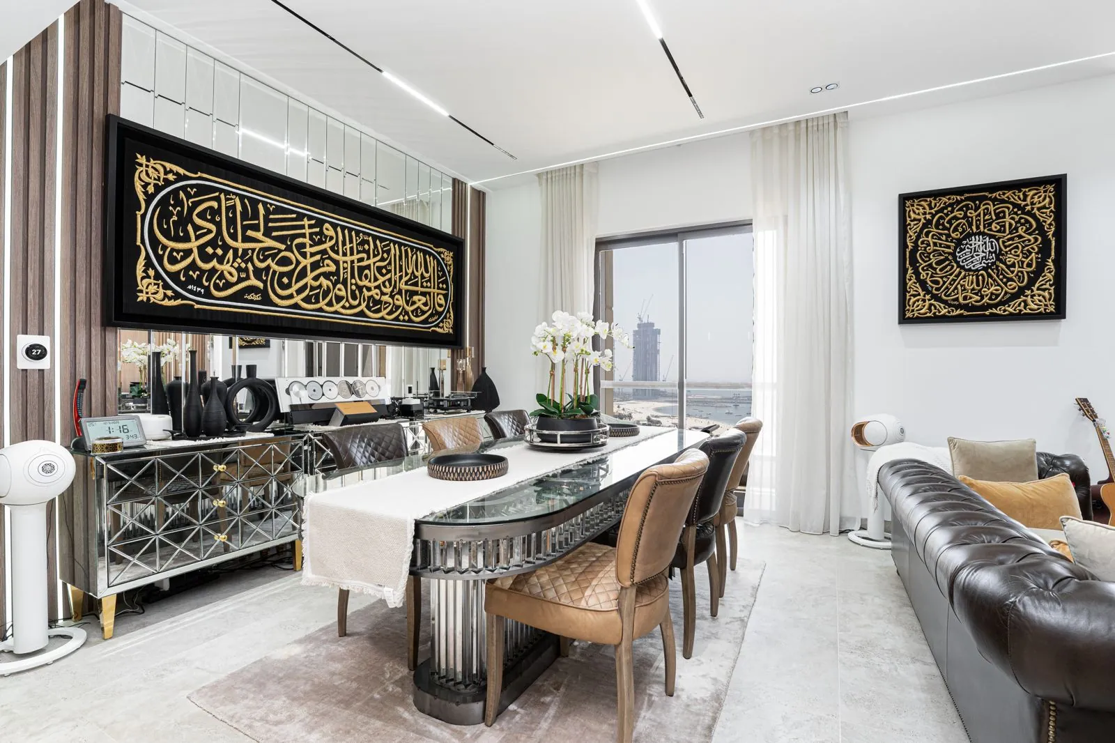 Completed dining area with bespoke screen and calligraphy artwork