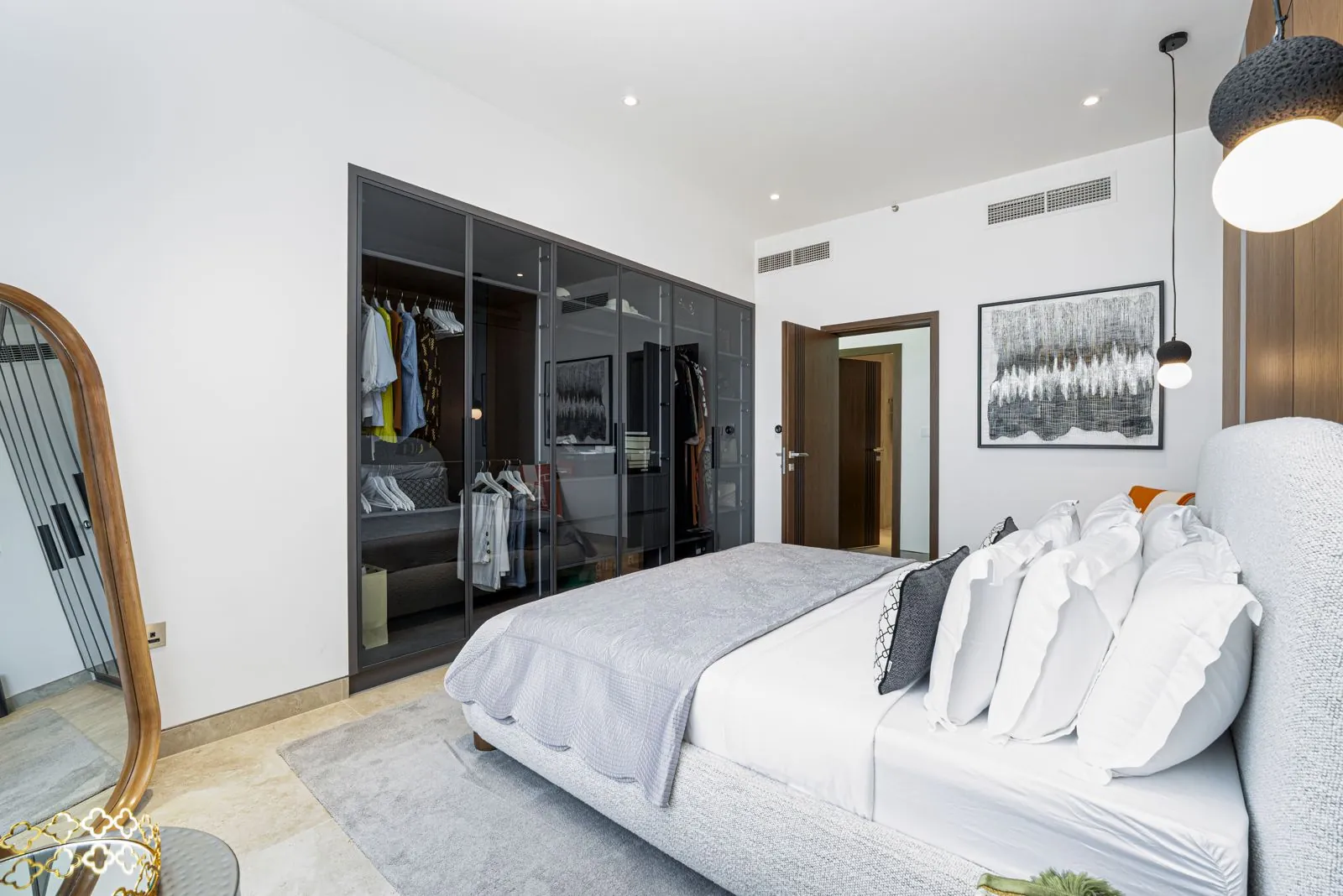 Completed principal bedroom with timber feature wall