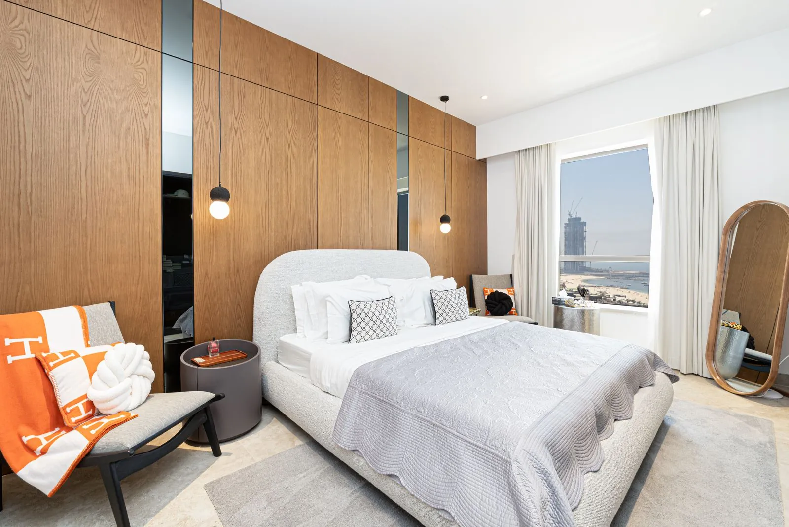 Completed bedroom with integrated wardrobe and vanity