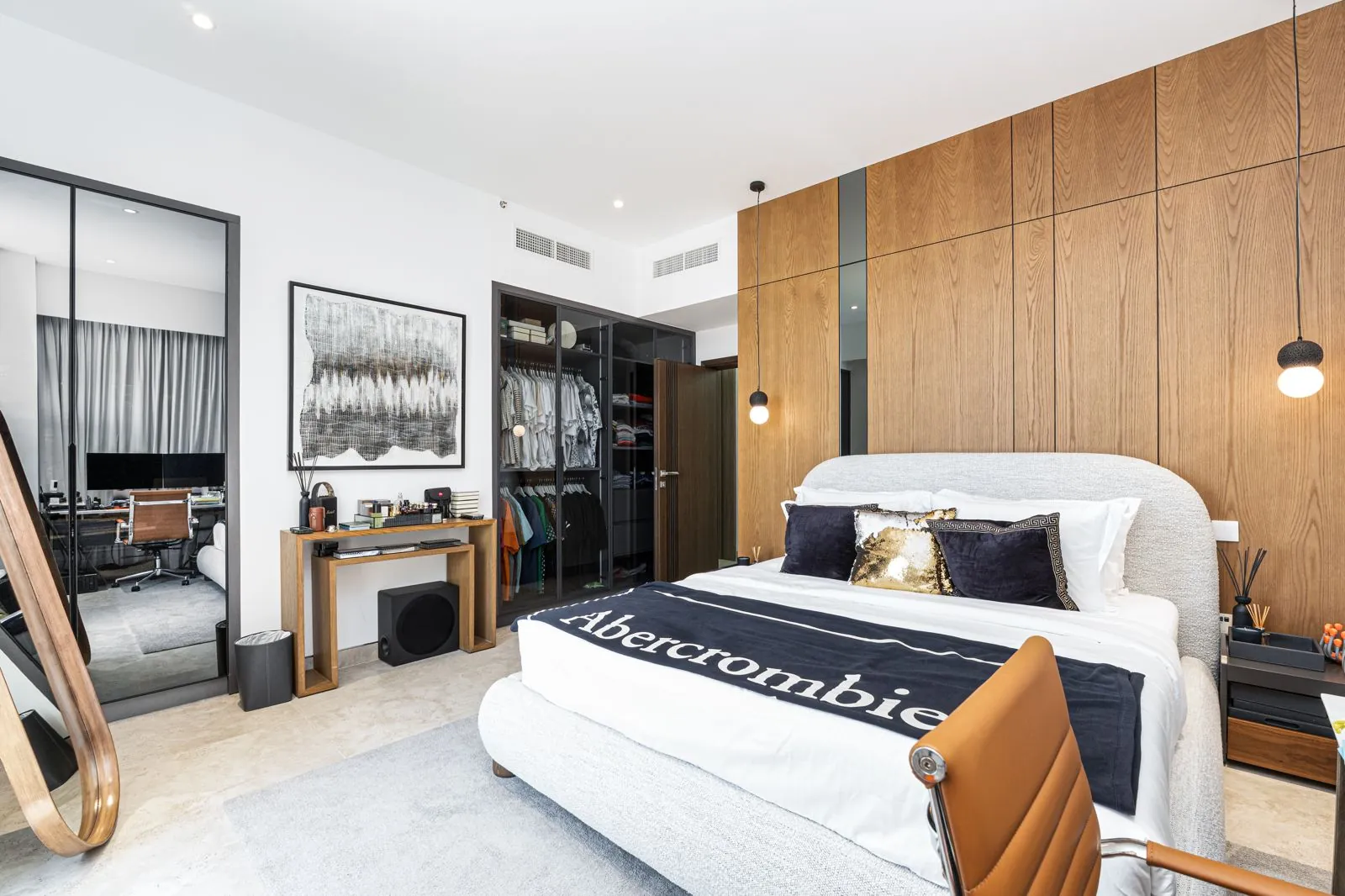 Completed guest bedroom with timber wall panels