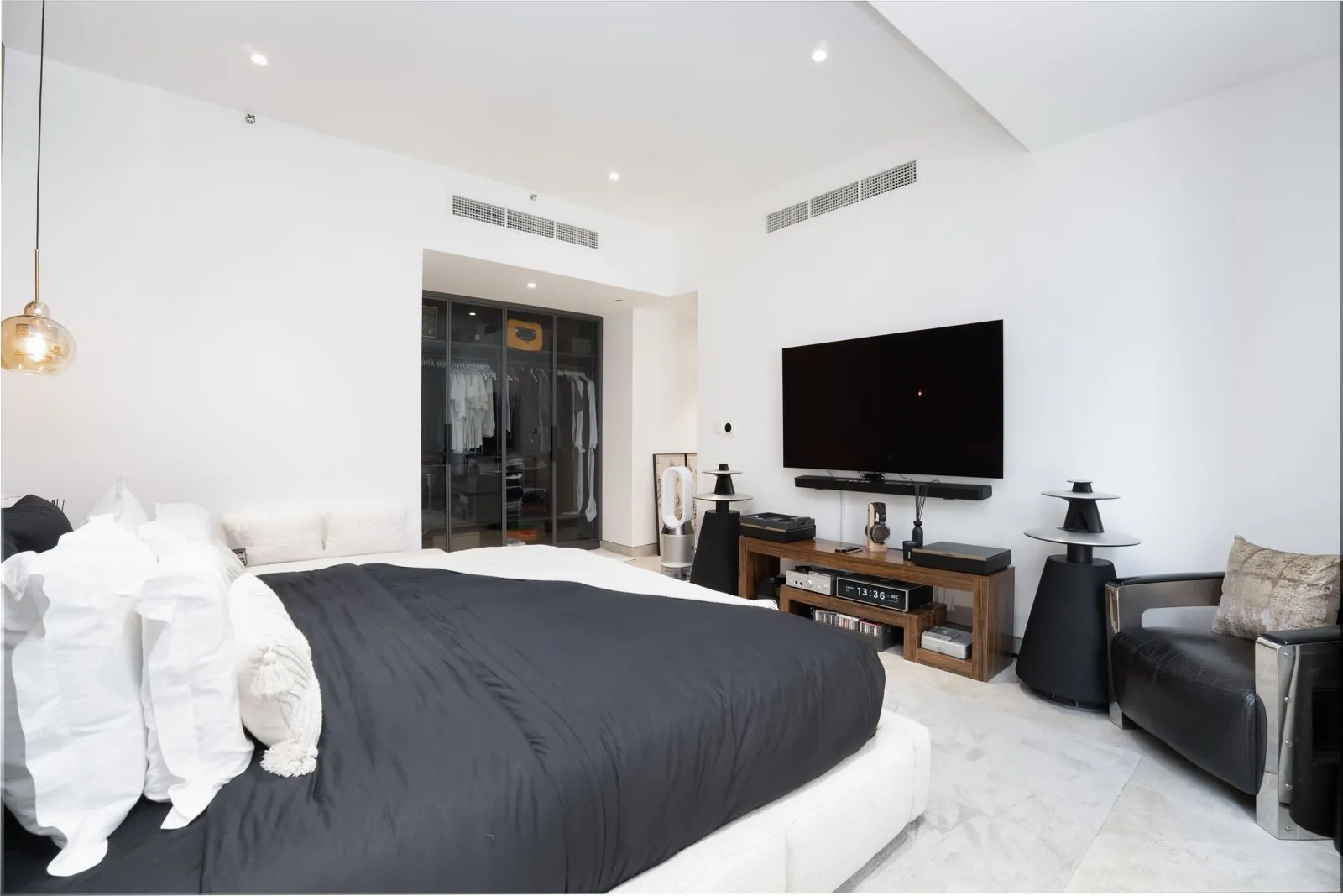 Completed bedroom opening to a coastal balcony