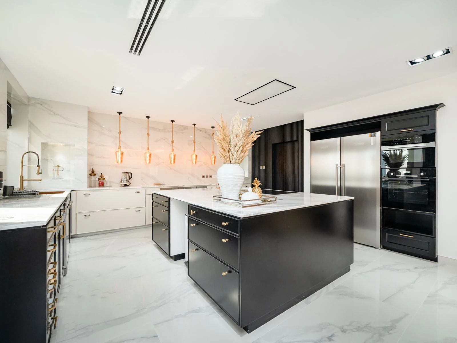 Completed black and white kitchen from opposite angle